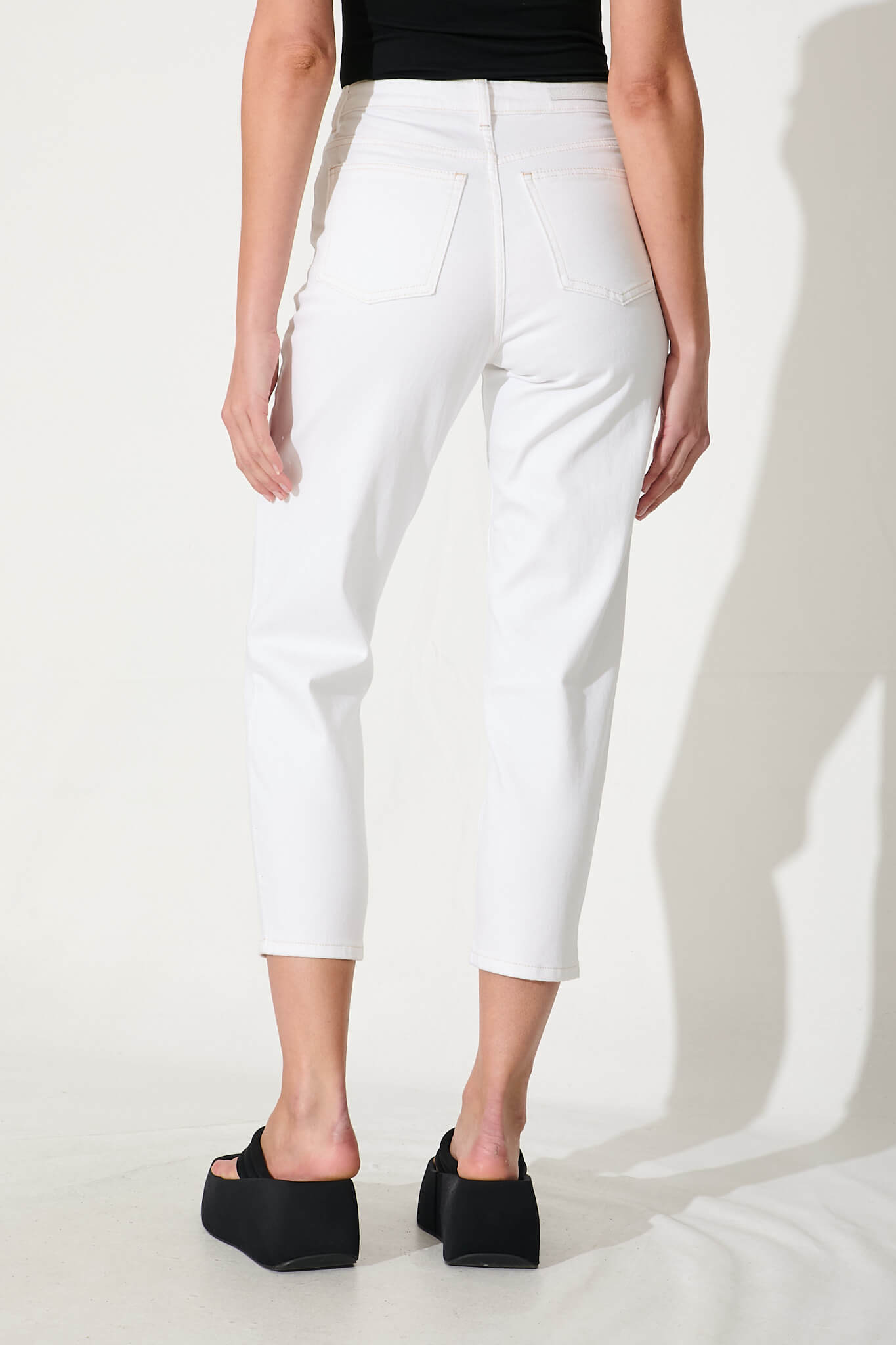 Delores High Rise Capri Straight Leg Jean In White Denim