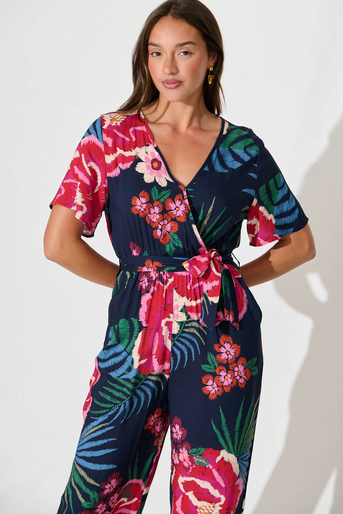 Calliope Jumpsuit In Navy With Red Floral Print