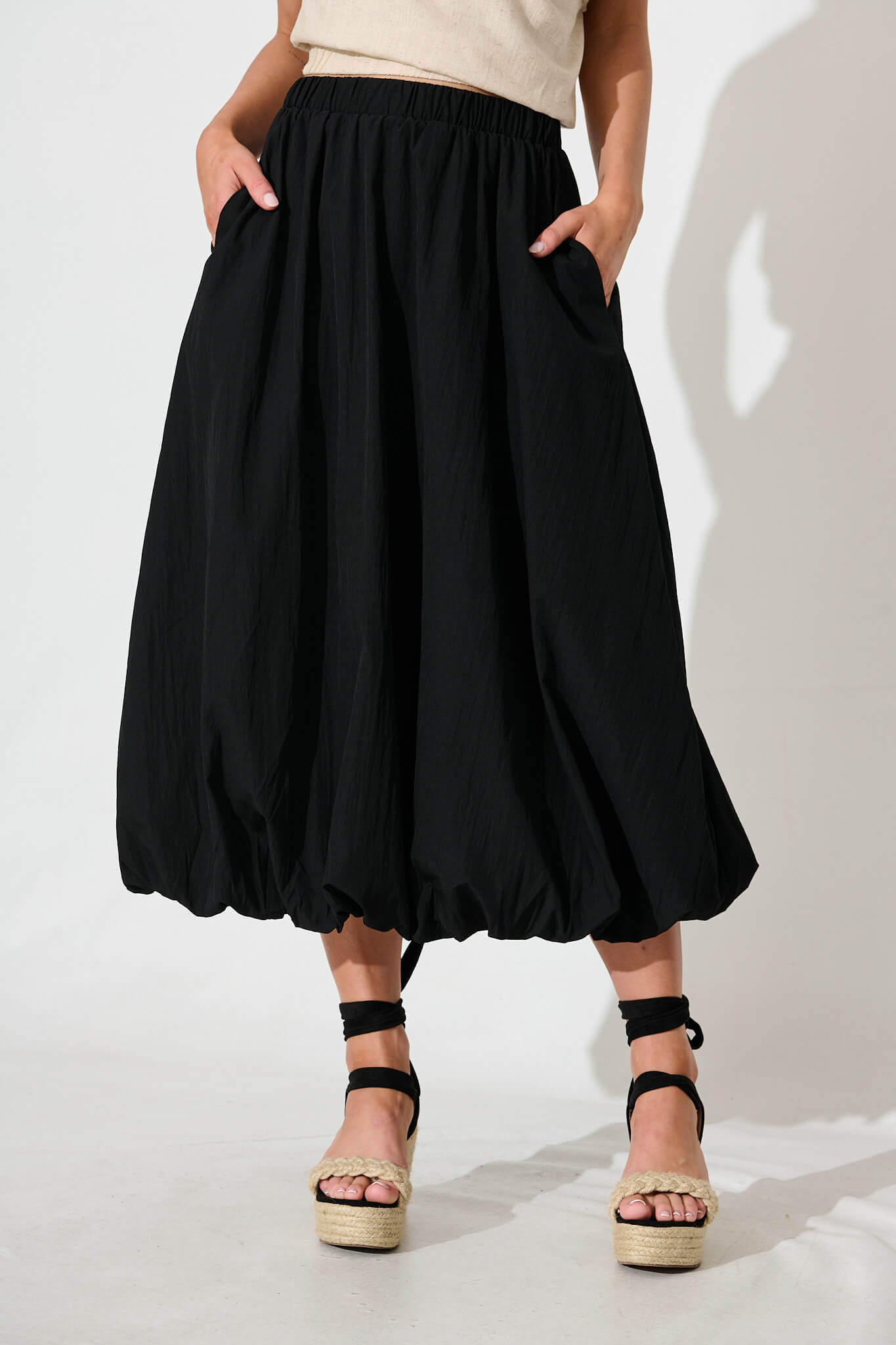 The Kiss Bubble Hem Midi Skirt in Black