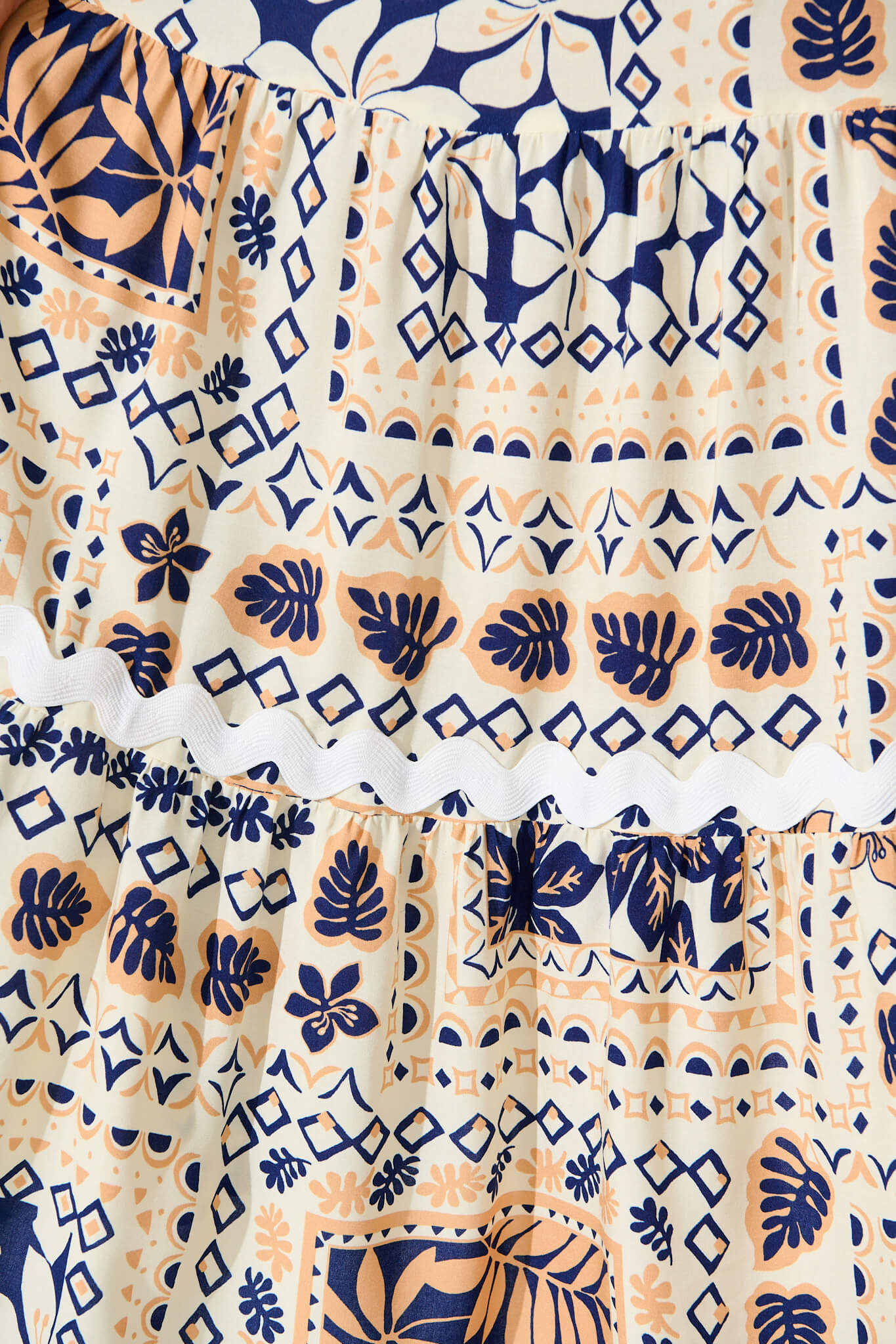 Laconia Midi Dress in Cream and Navy Patchwork with Ric Rac Trim