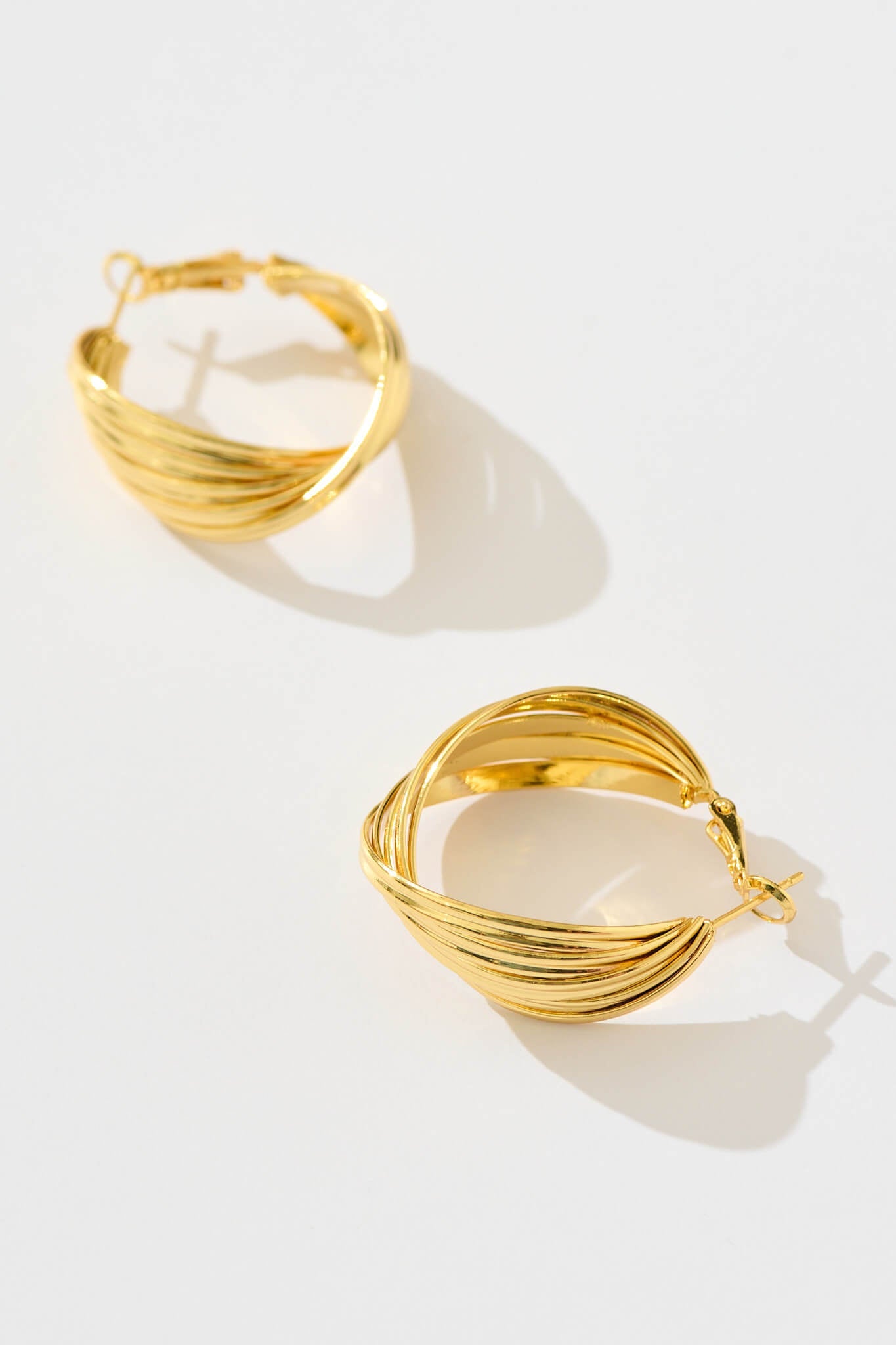 Hana Twisted Ridge Hoop Earrings in Gold