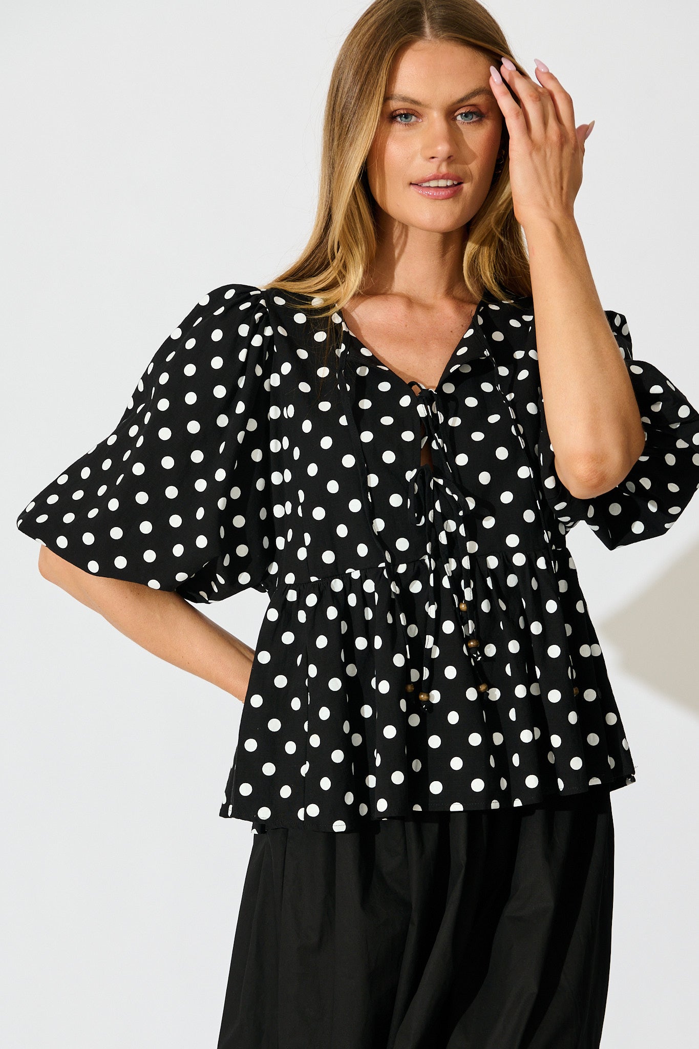 In the Spotlight Tie Front Top in Black with White Polka Dot