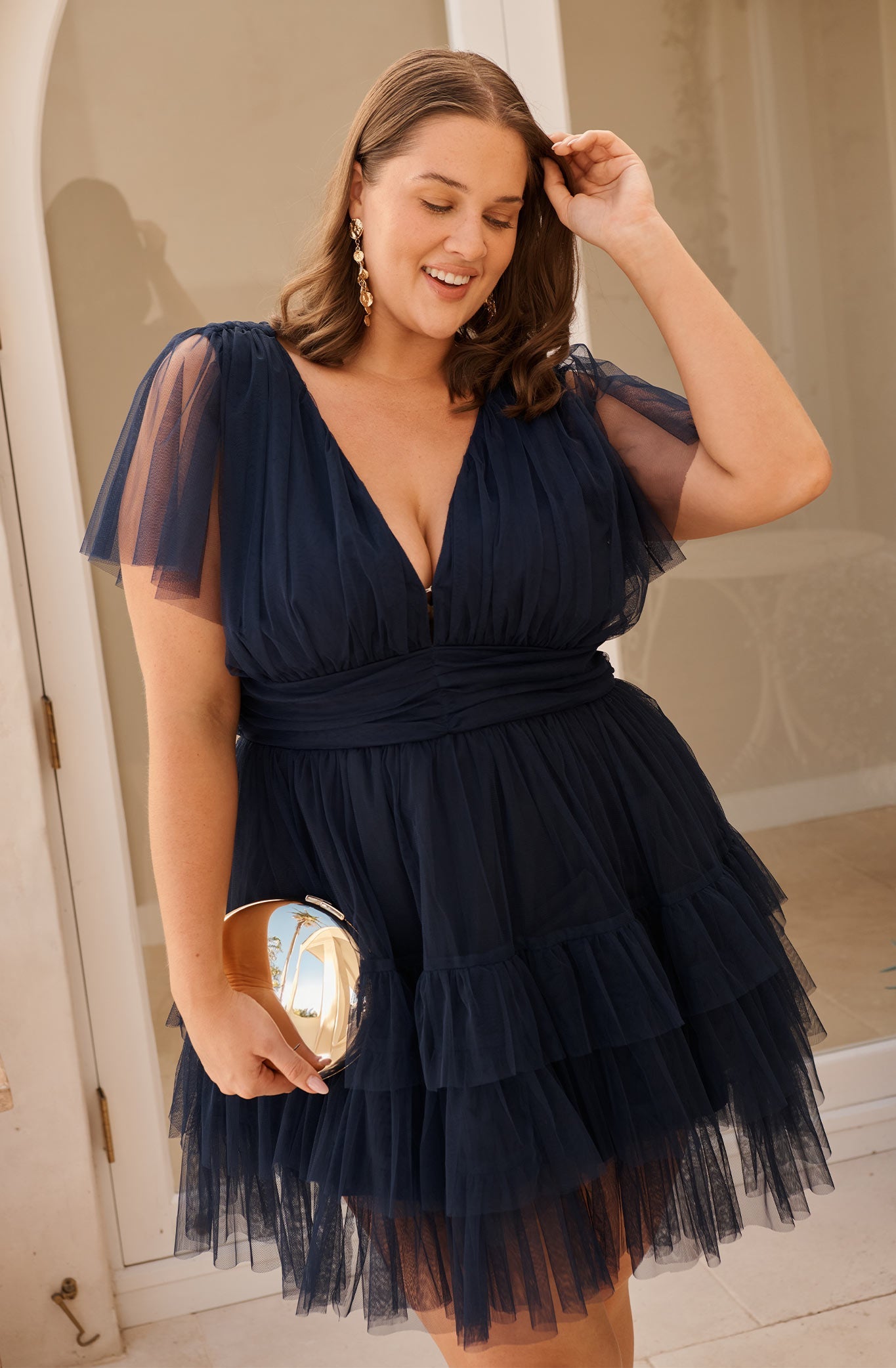 Celeste Clutch in Gold Metallic