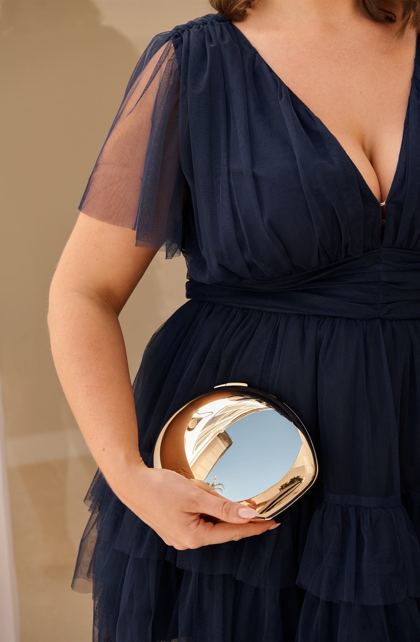 Celeste Clutch in Gold Metallic