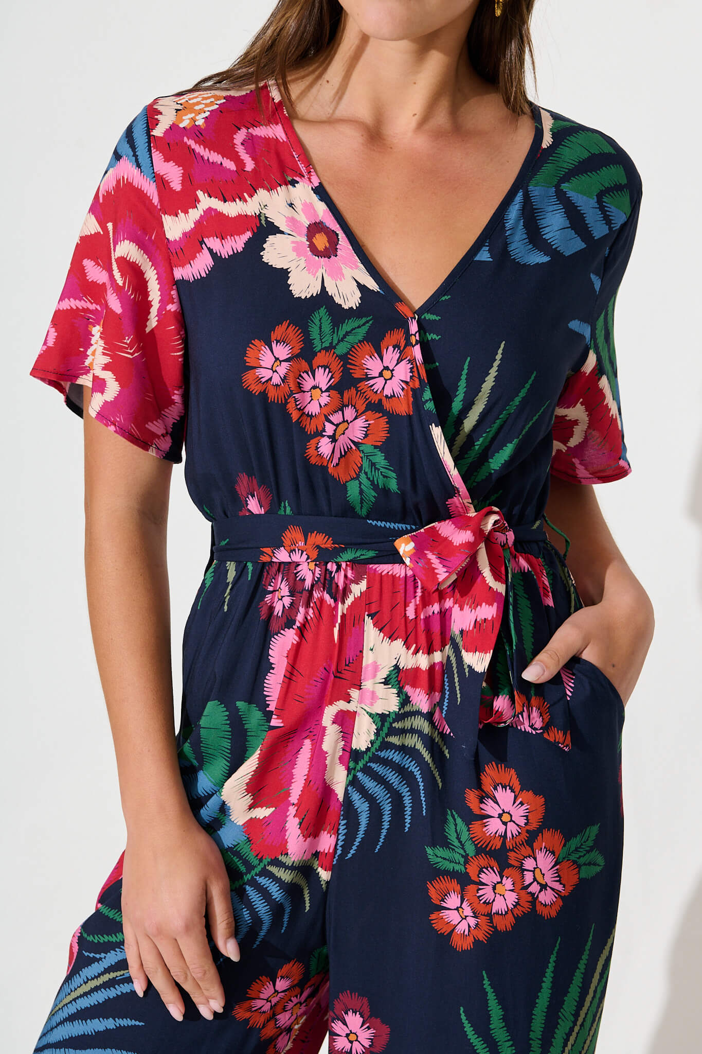 Calliope Jumpsuit In Navy With Red Floral Print