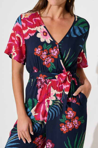 Calliope Jumpsuit In Navy With Red Floral Print