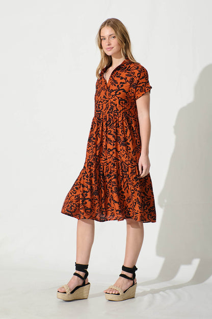 Ann Smock Dress in Rust with Black Print