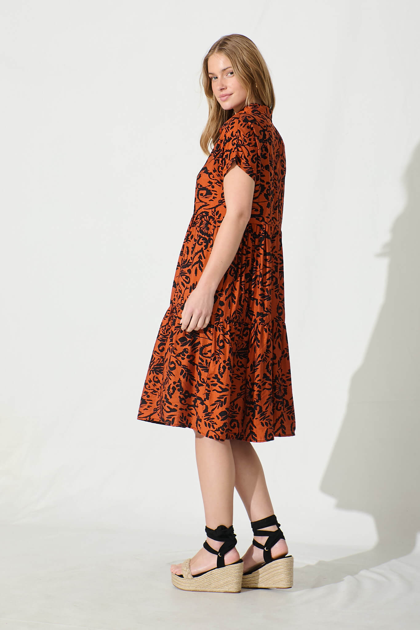 Ann Smock Dress in Rust with Black Print