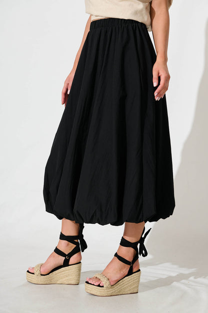 The Kiss Bubble Hem Midi Skirt in Black