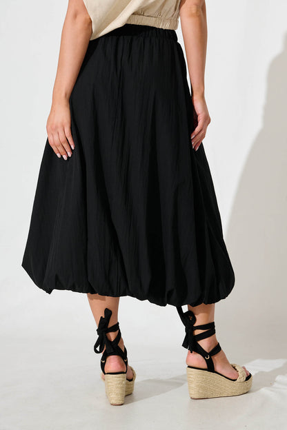 The Kiss Bubble Hem Midi Skirt in Black