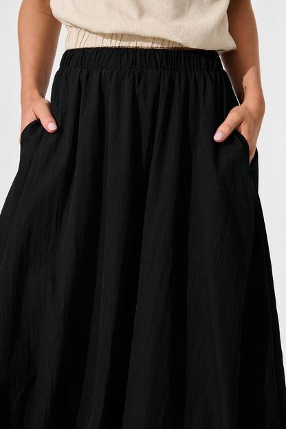 The Kiss Bubble Hem Midi Skirt in Black