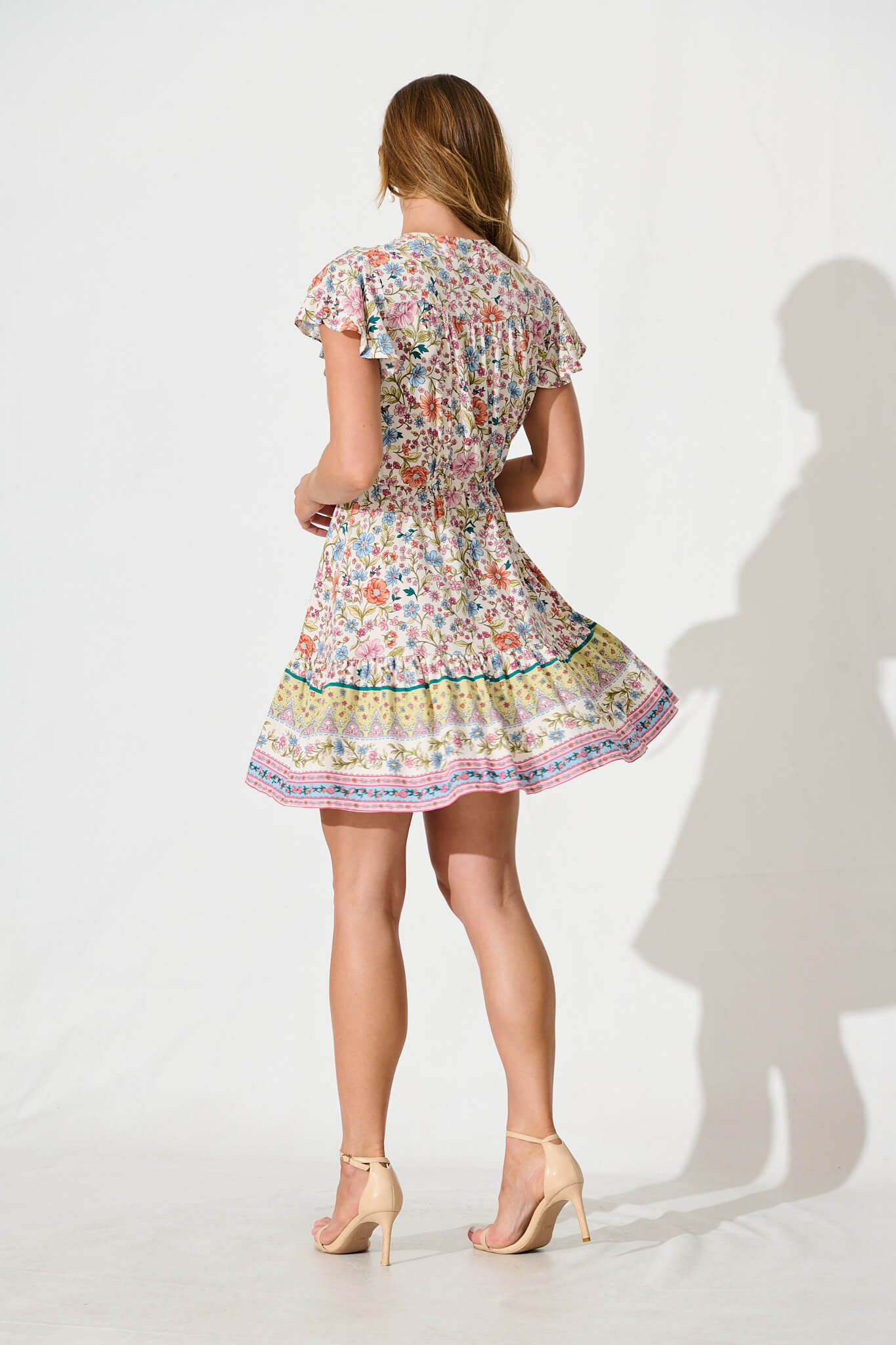 Kimbra Dress in White with Multi Floral Border Print