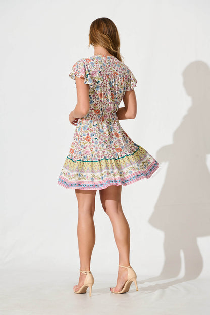 Kimbra Dress in White with Multi Floral Border Print