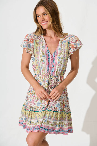 Kimbra Dress in White with Multi Floral Border Print