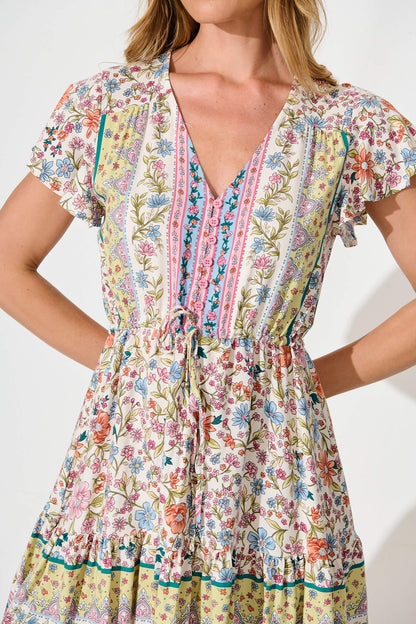 Kimbra Dress in White with Multi Floral Border Print