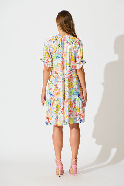 Pretty Please Smock Dress in White with Bright Multi Print