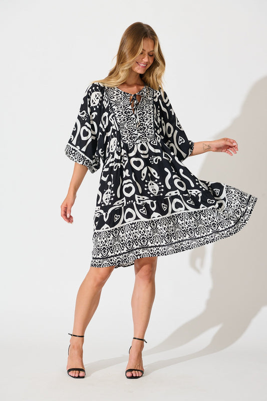 Kira Smock Dress in Black with White Border Print