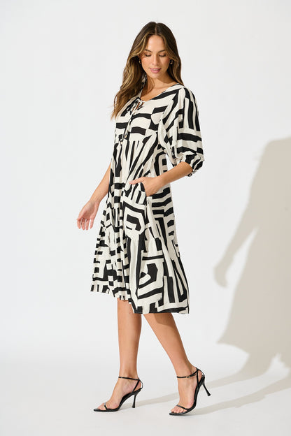 Luminous Midi Dress in Black with White Geometric Print