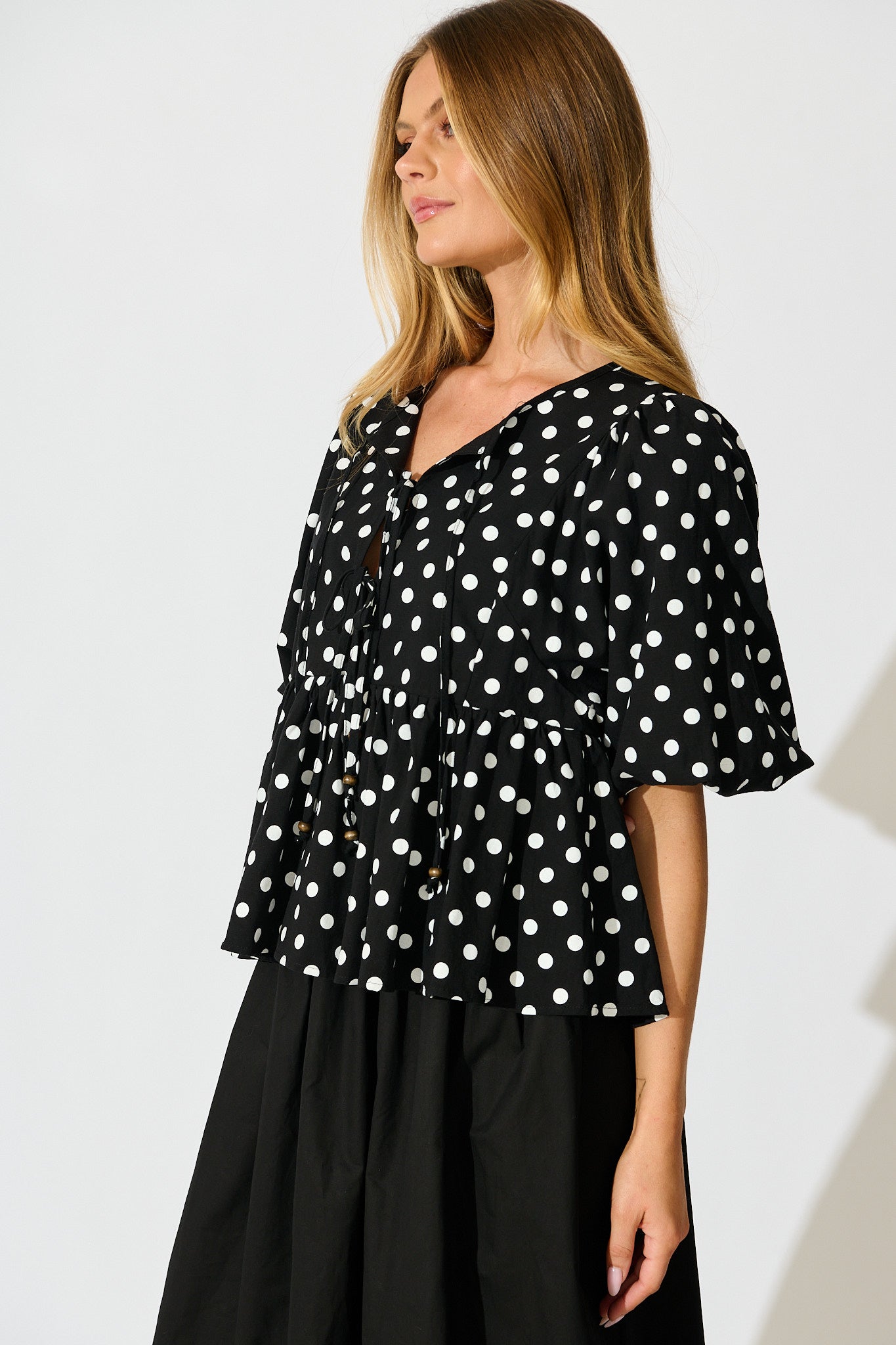 In the Spotlight Tie Front Top in Black with White Polka Dot