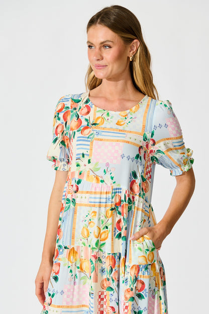 Nevi Tiered Midi Dress In Multi Conversational Print