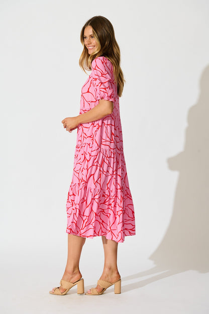Nevi Tiered Midi Dress In Pink With Red Swirl Print