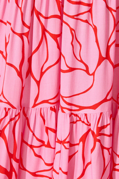 Nevi Tiered Midi Dress In Pink With Red Swirl Print