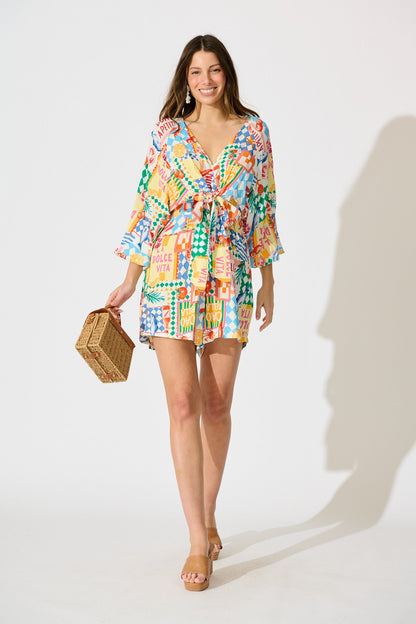 Otillie Playsuit in White Multi Conversational Print