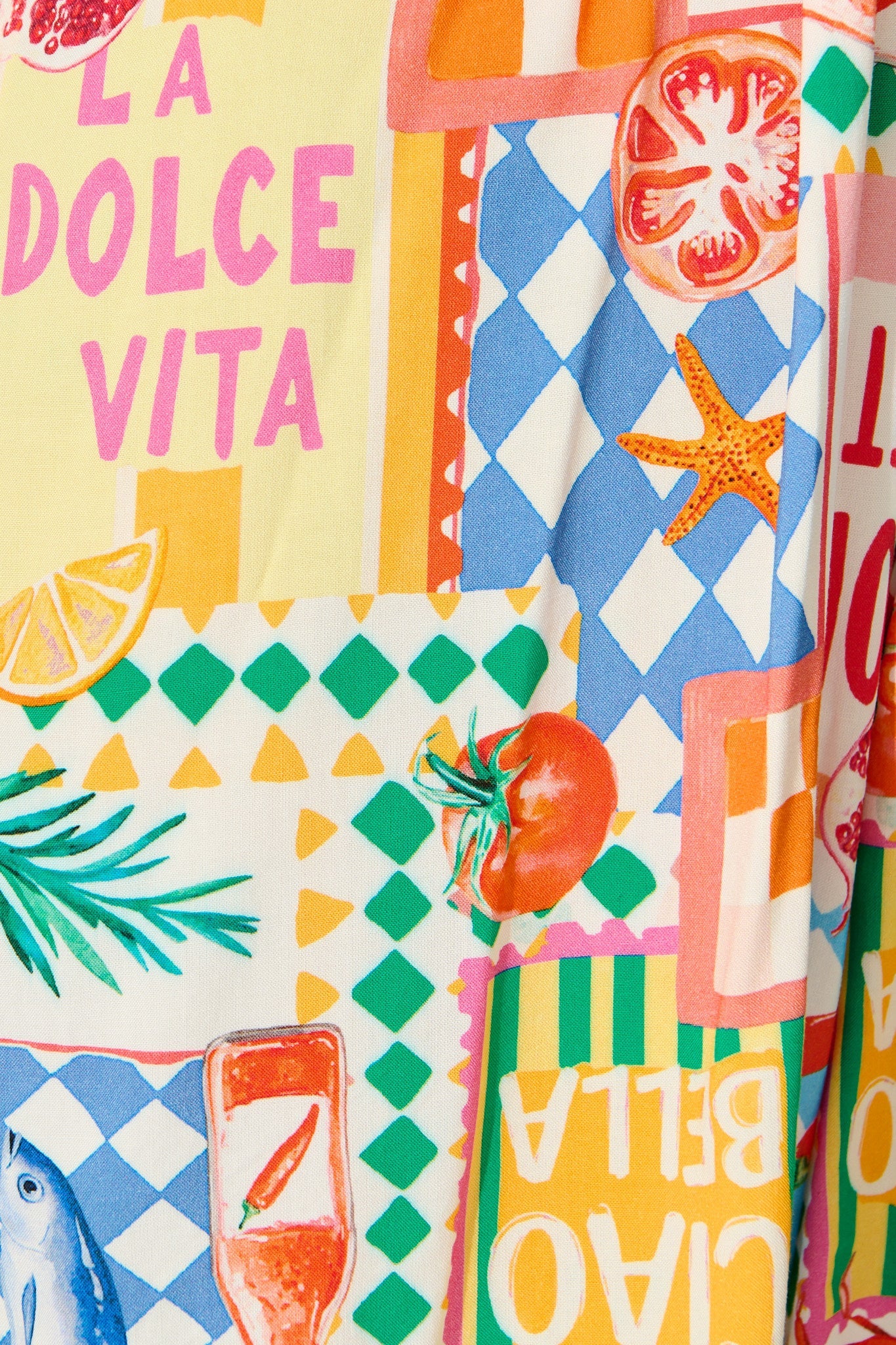 Otillie Playsuit in White Multi Conversational Print